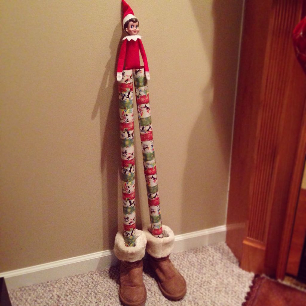 Elf on the Shelf gets tall with wrapping paper stilts